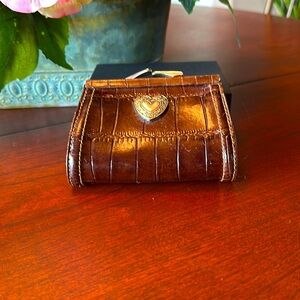 EUC CHANGE OR KEEPSAKE WALLET. Silver hardware with heart decoration on front